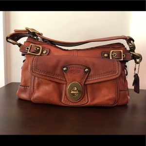 Coach Legacy stripe whiskey bag